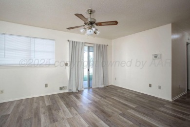 The sweetest 4/2/2 home is nestled on a quiet cul-de-sac in the on Ross Rogers Municipal Golf Course in Texas - for sale on GolfHomes.com, golf home, golf lot