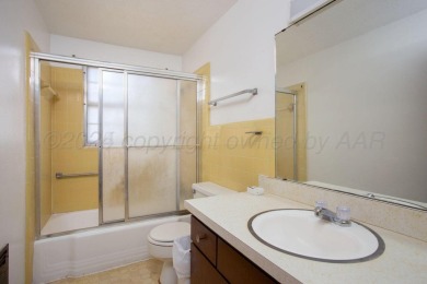 The sweetest 4/2/2 home is nestled on a quiet cul-de-sac in the on Ross Rogers Municipal Golf Course in Texas - for sale on GolfHomes.com, golf home, golf lot