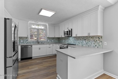 Completely renovated, one-level brick home in the gated golf on Beau Rivage Golf and Resort in North Carolina - for sale on GolfHomes.com, golf home, golf lot