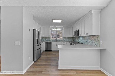 Completely renovated, one-level brick home in the gated golf on Beau Rivage Golf and Resort in North Carolina - for sale on GolfHomes.com, golf home, golf lot