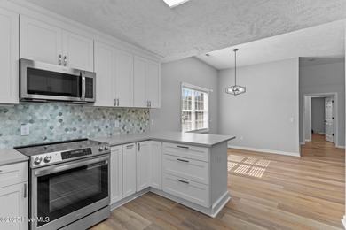 Completely renovated, one-level brick home in the gated golf on Beau Rivage Golf and Resort in North Carolina - for sale on GolfHomes.com, golf home, golf lot