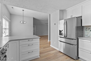 Completely renovated, one-level brick home in the gated golf on Beau Rivage Golf and Resort in North Carolina - for sale on GolfHomes.com, golf home, golf lot