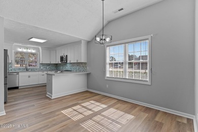 Completely renovated, one-level brick home in the gated golf on Beau Rivage Golf and Resort in North Carolina - for sale on GolfHomes.com, golf home, golf lot