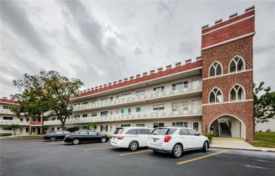 Don't miss this coveted first floor outside corner unit on On Top Of The World Golf Course in Florida - for sale on GolfHomes.com, golf home, golf lot