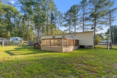 Remodeled manufactured home in lovely waterfront golf course on Tanglewood Shores Golf Club in Virginia - for sale on GolfHomes.com, golf home, golf lot