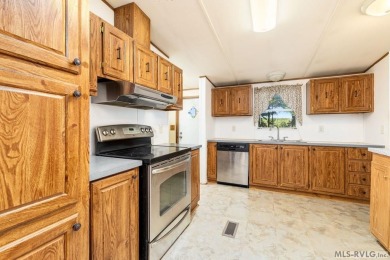 Remodeled manufactured home in lovely waterfront golf course on Tanglewood Shores Golf Club in Virginia - for sale on GolfHomes.com, golf home, golf lot