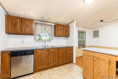 Remodeled manufactured home in lovely waterfront golf course on Tanglewood Shores Golf Club in Virginia - for sale on GolfHomes.com, golf home, golf lot