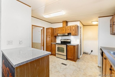Remodeled manufactured home in lovely waterfront golf course on Tanglewood Shores Golf Club in Virginia - for sale on GolfHomes.com, golf home, golf lot