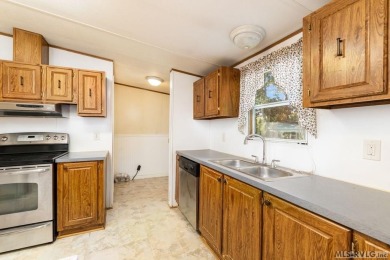 Remodeled manufactured home in lovely waterfront golf course on Tanglewood Shores Golf Club in Virginia - for sale on GolfHomes.com, golf home, golf lot