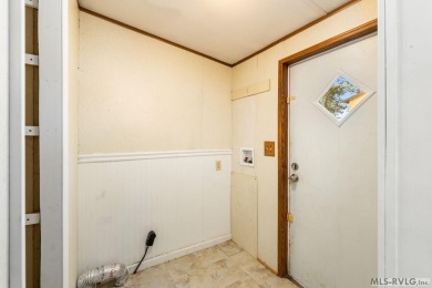 Remodeled manufactured home in lovely waterfront golf course on Tanglewood Shores Golf Club in Virginia - for sale on GolfHomes.com, golf home, golf lot