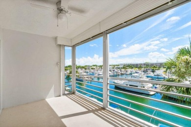 Welcome to this well-maintained 2 bedroom, 2 bathroom condo on North Palm Beach Country Club in Florida - for sale on GolfHomes.com, golf home, golf lot