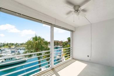 Welcome to this well-maintained 2 bedroom, 2 bathroom condo on North Palm Beach Country Club in Florida - for sale on GolfHomes.com, golf home, golf lot