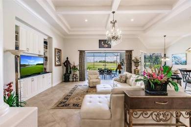 This stunning Mediterranean style stucco home is on a golf on Venetian Golf and River Club in Florida - for sale on GolfHomes.com, golf home, golf lot