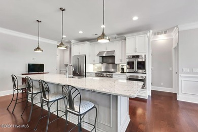 Quality and beauty combine in this elegant home located in the on Compass Pointe Golf Course in North Carolina - for sale on GolfHomes.com, golf home, golf lot