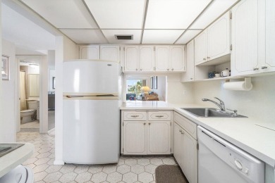 Welcome to this well-maintained 2 bedroom, 2 bathroom condo on North Palm Beach Country Club in Florida - for sale on GolfHomes.com, golf home, golf lot