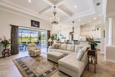 This stunning Mediterranean style stucco home is on a golf on Venetian Golf and River Club in Florida - for sale on GolfHomes.com, golf home, golf lot