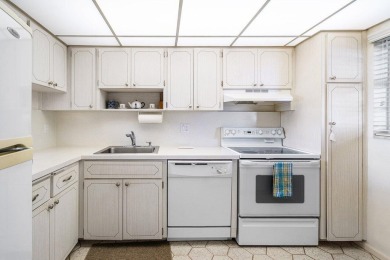 Welcome to this well-maintained 2 bedroom, 2 bathroom condo on North Palm Beach Country Club in Florida - for sale on GolfHomes.com, golf home, golf lot