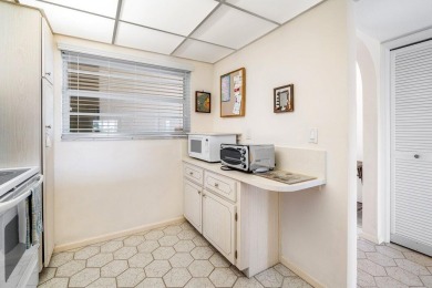 Welcome to this well-maintained 2 bedroom, 2 bathroom condo on North Palm Beach Country Club in Florida - for sale on GolfHomes.com, golf home, golf lot
