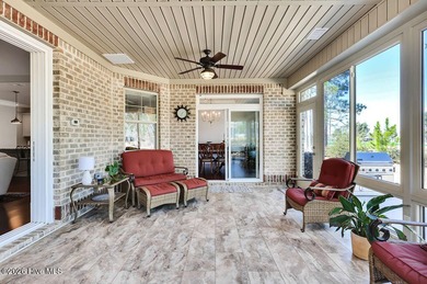 Quality and beauty combine in this elegant home located in the on Compass Pointe Golf Course in North Carolina - for sale on GolfHomes.com, golf home, golf lot