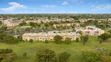 Reduced to sell!! Top Floor, Corner Unit, spacious and open with on Sunrise Lakes Phase III in Florida - for sale on GolfHomes.com, golf home, golf lot