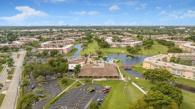 Reduced to sell!! Top Floor, Corner Unit, spacious and open with on Sunrise Lakes Phase III in Florida - for sale on GolfHomes.com, golf home, golf lot