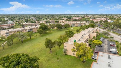 Reduced to sell!! Top Floor, Corner Unit, spacious and open with on Sunrise Lakes Phase III in Florida - for sale on GolfHomes.com, golf home, golf lot