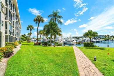Welcome to this well-maintained 2 bedroom, 2 bathroom condo on North Palm Beach Country Club in Florida - for sale on GolfHomes.com, golf home, golf lot