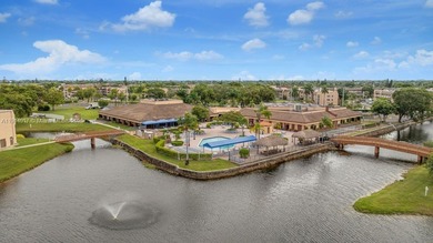 Reduced to sell!! Top Floor, Corner Unit, spacious and open with on Sunrise Lakes Phase III in Florida - for sale on GolfHomes.com, golf home, golf lot