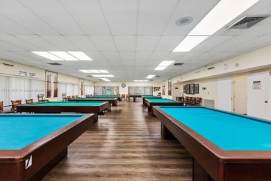 Reduced to sell!! Top Floor, Corner Unit, spacious and open with on Sunrise Lakes Phase III in Florida - for sale on GolfHomes.com, golf home, golf lot