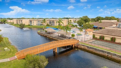 Reduced to sell!! Top Floor, Corner Unit, spacious and open with on Sunrise Lakes Phase III in Florida - for sale on GolfHomes.com, golf home, golf lot