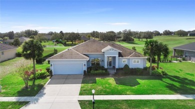 This beautifully landscaped and meticulously kept Black Bear on Black Bear Golf Club in Florida - for sale on GolfHomes.com, golf home, golf lot