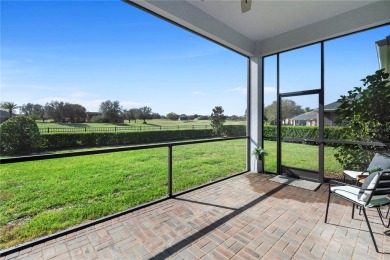 This beautifully landscaped and meticulously kept Black Bear on Black Bear Golf Club in Florida - for sale on GolfHomes.com, golf home, golf lot