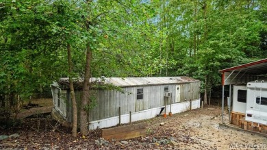 Discover the perfect opportunity to enjoy lake life at an on River Ridge Golf Club in Virginia - for sale on GolfHomes.com, golf home, golf lot