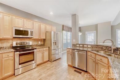 Welcome home to 5365 Cambridge Bay Drive. A beautifully on Highland Creek Golf Club in North Carolina - for sale on GolfHomes.com, golf home, golf lot