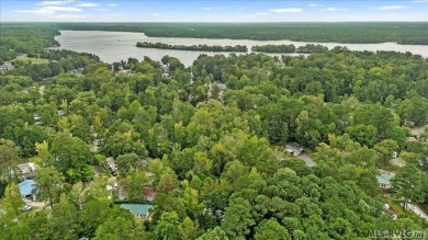 Discover the perfect opportunity to enjoy lake life at an on River Ridge Golf Club in Virginia - for sale on GolfHomes.com, golf home, golf lot