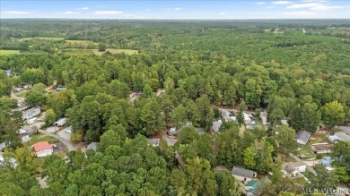 Discover the perfect opportunity to enjoy lake life at an on River Ridge Golf Club in Virginia - for sale on GolfHomes.com, golf home, golf lot