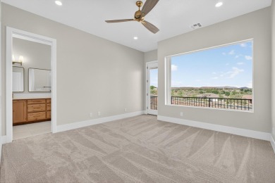 Experience breathtaking views of the city, mountains, and golf on Coral Canyon Golf Course in Utah - for sale on GolfHomes.com, golf home, golf lot