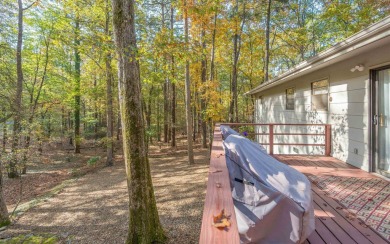 Move in ready home situated amidst the trees! This tranquil home on DeSoto Golf Course in Arkansas - for sale on GolfHomes.com, golf home, golf lot