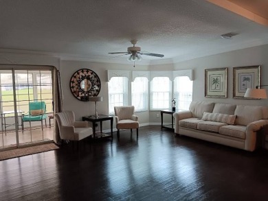 Great kitchen area with pass through counter and open walkway to on Four Lakes Golf Club in Florida - for sale on GolfHomes.com, golf home, golf lot