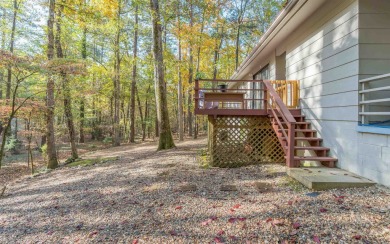 Move in ready home situated amidst the trees! This tranquil home on DeSoto Golf Course in Arkansas - for sale on GolfHomes.com, golf home, golf lot