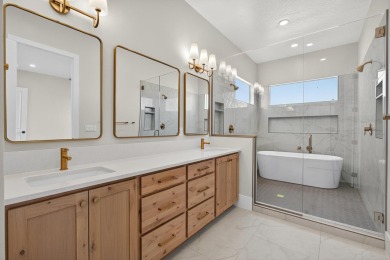 Experience breathtaking views of the city, mountains, and golf on Coral Canyon Golf Course in Utah - for sale on GolfHomes.com, golf home, golf lot