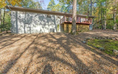 Move in ready home situated amidst the trees! This tranquil home on DeSoto Golf Course in Arkansas - for sale on GolfHomes.com, golf home, golf lot