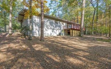 Move in ready home situated amidst the trees! This tranquil home on DeSoto Golf Course in Arkansas - for sale on GolfHomes.com, golf home, golf lot