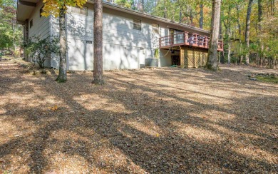 Move in ready home situated amidst the trees! This tranquil home on DeSoto Golf Course in Arkansas - for sale on GolfHomes.com, golf home, golf lot