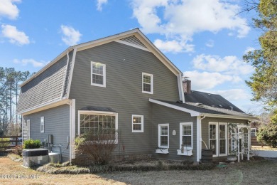 Discover this delightful 4 bedroom, 3 1/2 bath home that on Jacksonville Country Club in North Carolina - for sale on GolfHomes.com, golf home, golf lot