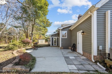 Discover this delightful 4 bedroom, 3 1/2 bath home that on Jacksonville Country Club in North Carolina - for sale on GolfHomes.com, golf home, golf lot