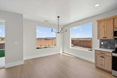 Experience breathtaking views of the city, mountains, and golf on Coral Canyon Golf Course in Utah - for sale on GolfHomes.com, golf home, golf lot
