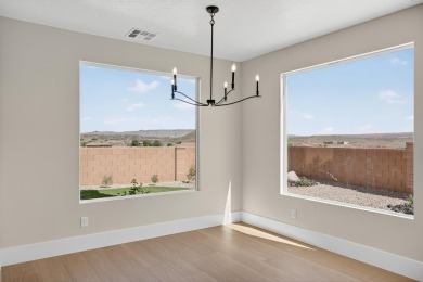 Experience breathtaking views of the city, mountains, and golf on Coral Canyon Golf Course in Utah - for sale on GolfHomes.com, golf home, golf lot