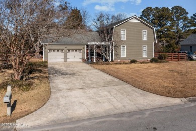 Discover this delightful 4 bedroom, 3 1/2 bath home that on Jacksonville Country Club in North Carolina - for sale on GolfHomes.com, golf home, golf lot