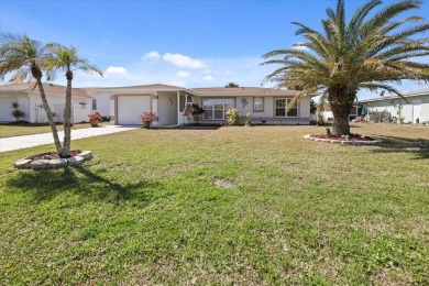 This fully furnished, three-bedroom, three-bathroom waterfront on Rotonda Golf and Country Club The Hills Course in Florida - for sale on GolfHomes.com, golf home, golf lot